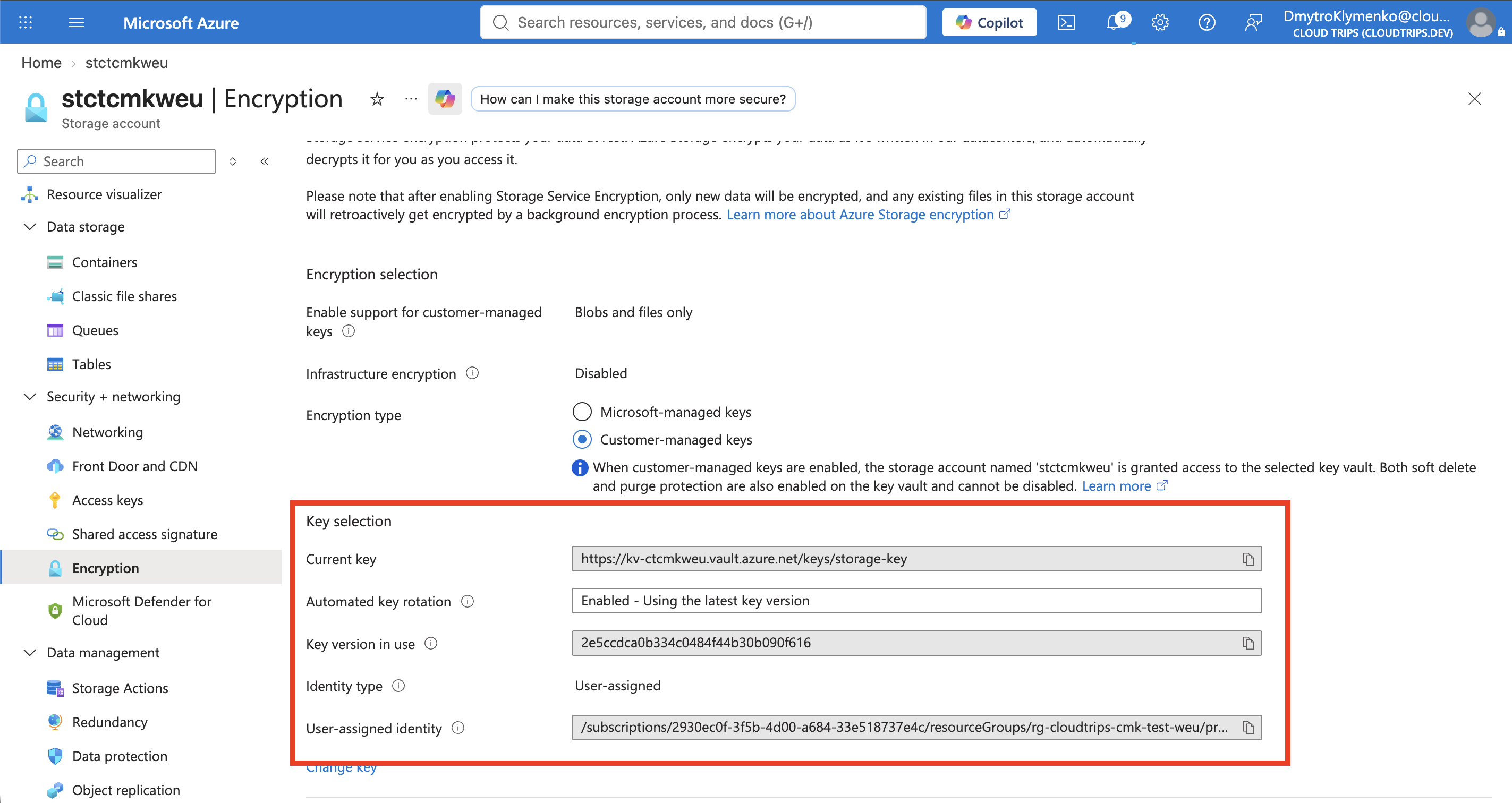 Storage Encryption settings showing the customer-managed Key Vault key and user-assigned identity