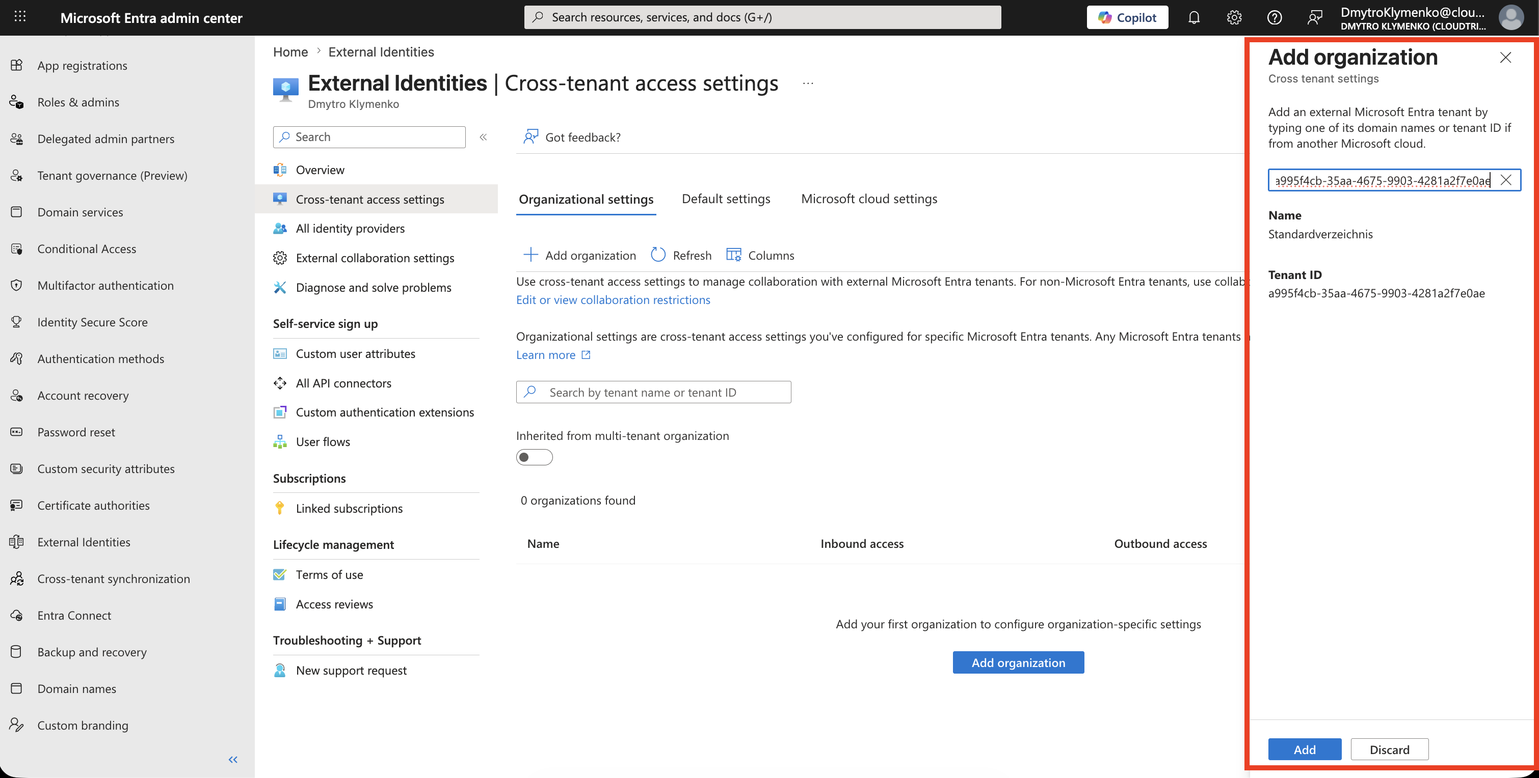 Add organization pane showing the partner domain or tenant ID, resolved organization name, tenant ID, and Add button