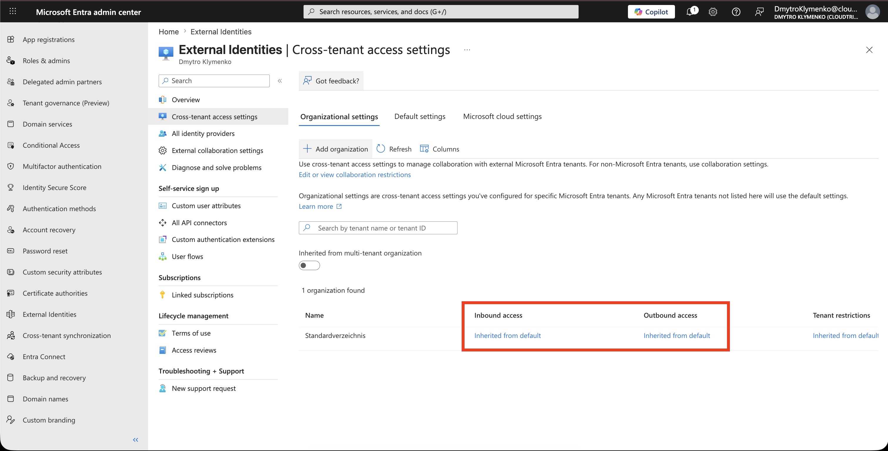 Organizational settings list showing the added partner and Inherited from default under inbound and outbound access