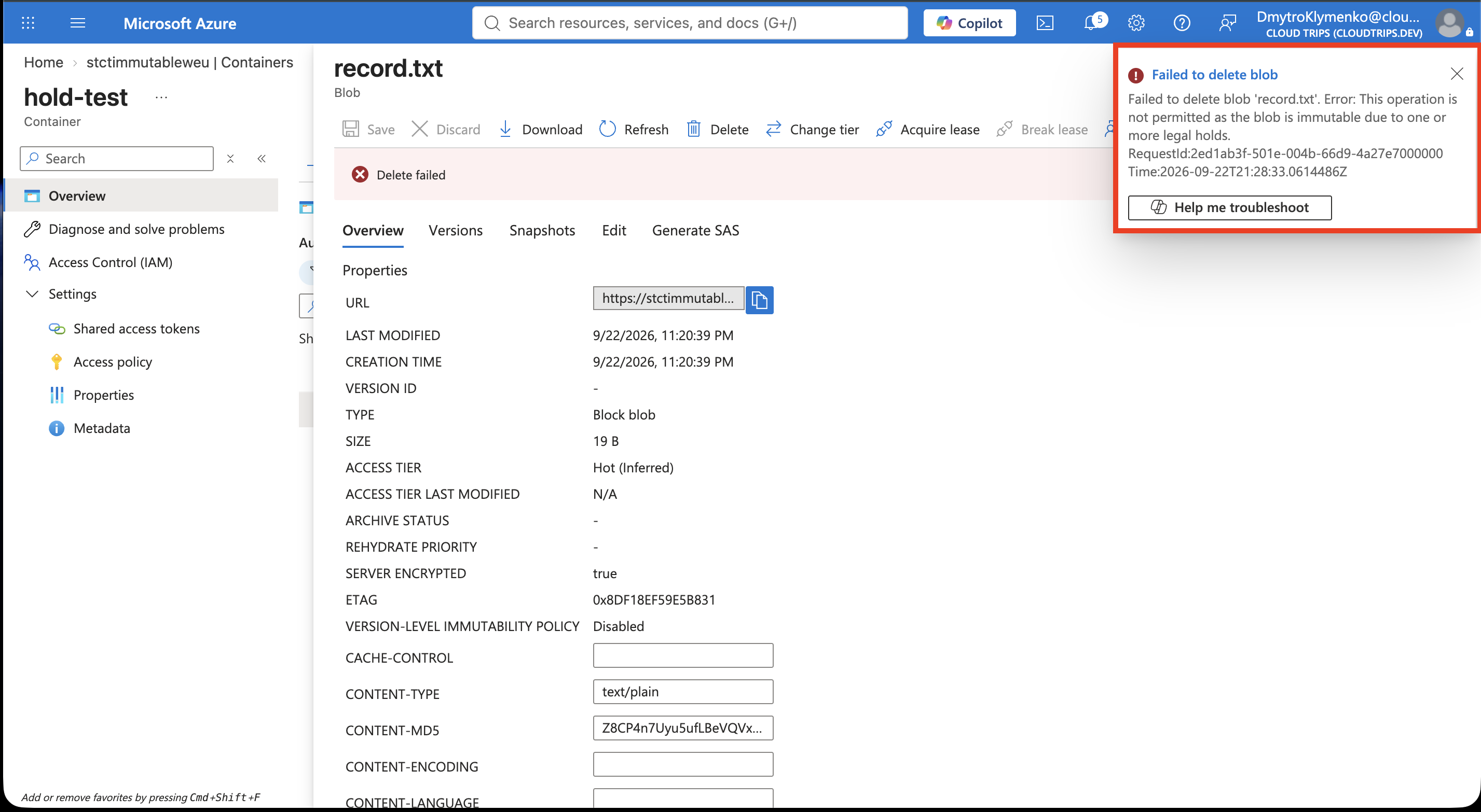 Deletion of record.txt in hold-test rejected because a legal hold is active