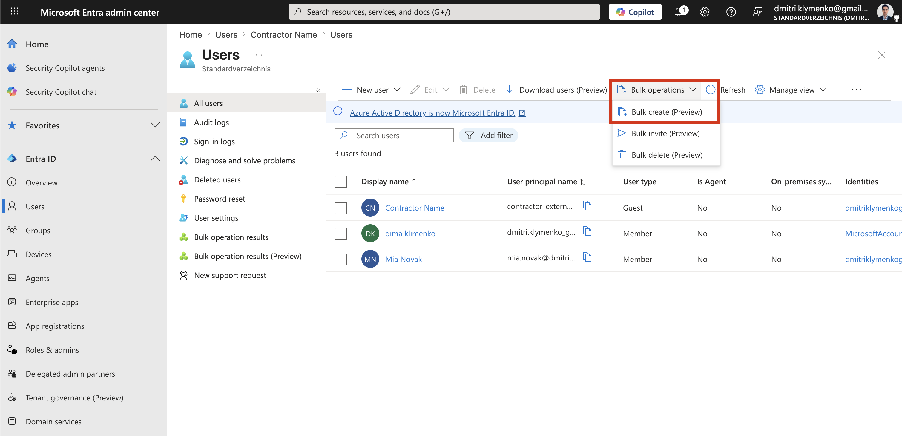 Microsoft Entra Users page with the New user menu expanded and Bulk create users option visible