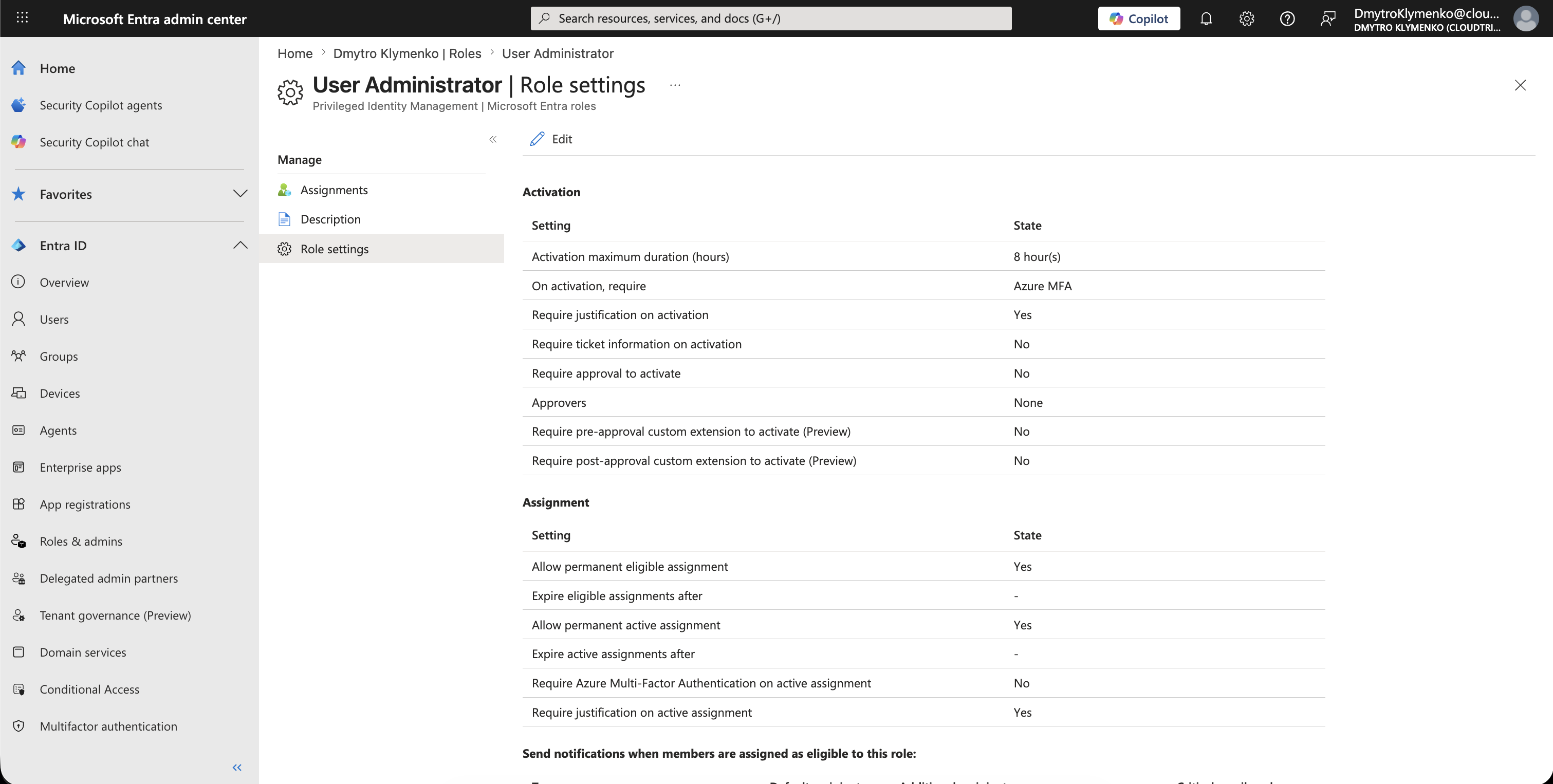 PIM Microsoft Entra roles page showing User Administrator role settings