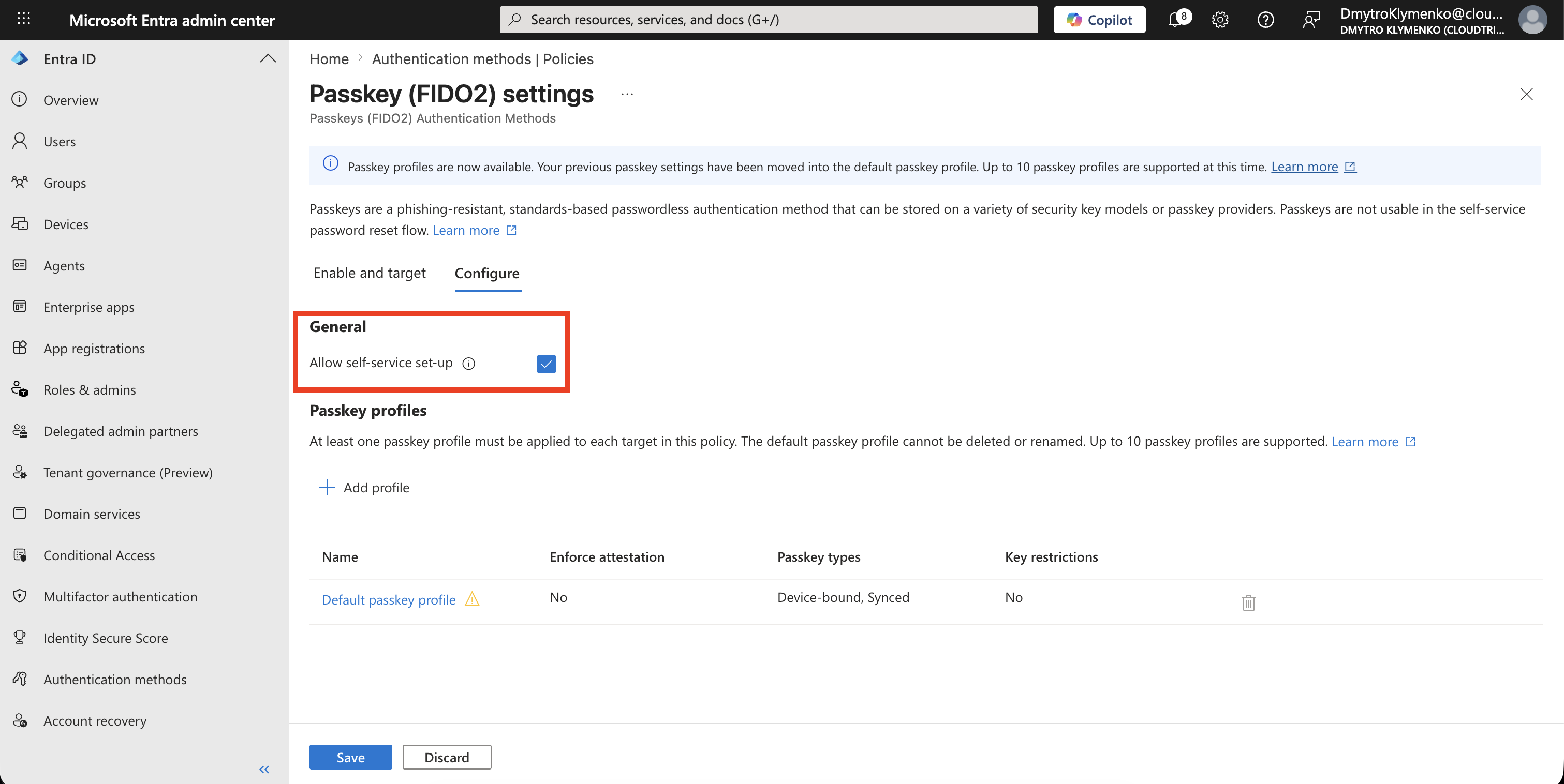 Passkey FIDO2 Configure tab showing Allow self-service set up enabled